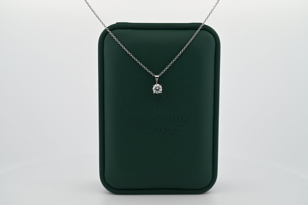 Ethernal Sparkle 0.3 CT pendant on platinum chain, elegant packaging, symbol of timeless luxury and craftsmanship for women.