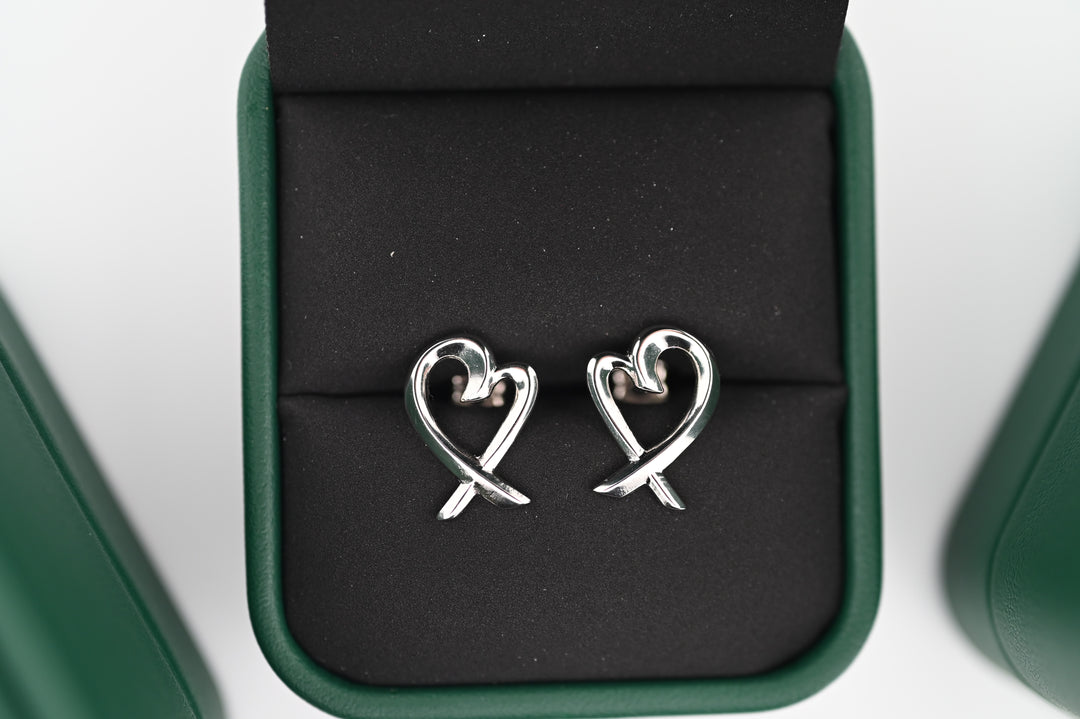 Cercei Eros platină în cutie verde, eleganță și romantism, ideali pentru cadou premium bijuterii femei.