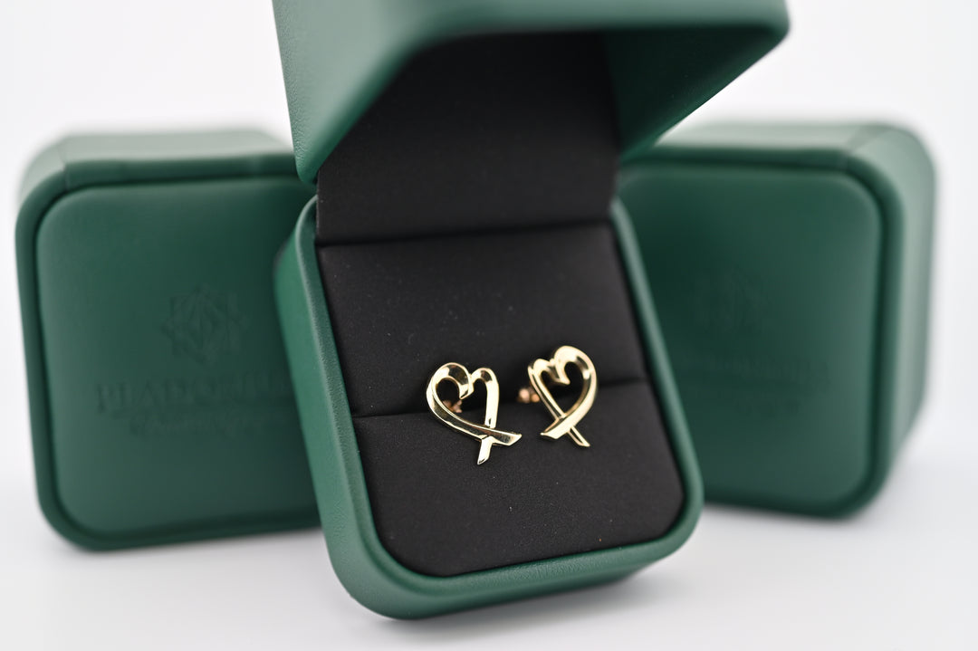 Cercei aur Eros, eleganți și sofisticati, inspirați de zeul iubirii, într-o cutie verde, ideal cadou pentru femei.