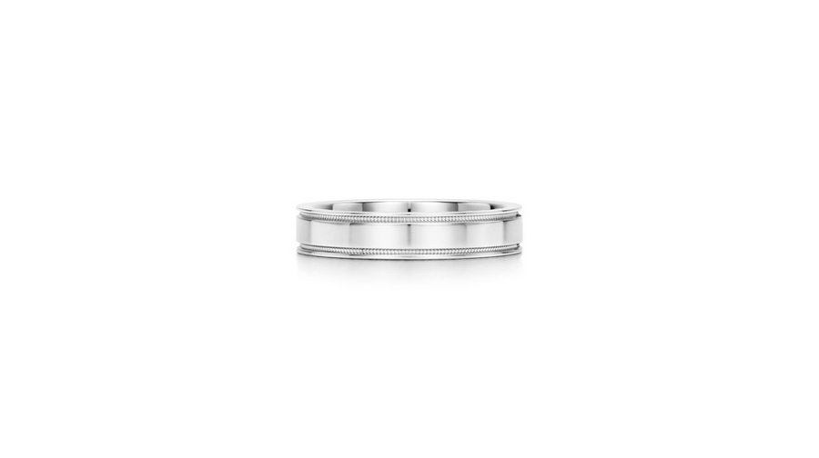 Elegant platinum wedding band with minimalist design, showcasing modern elegance and exceptional durability for women.