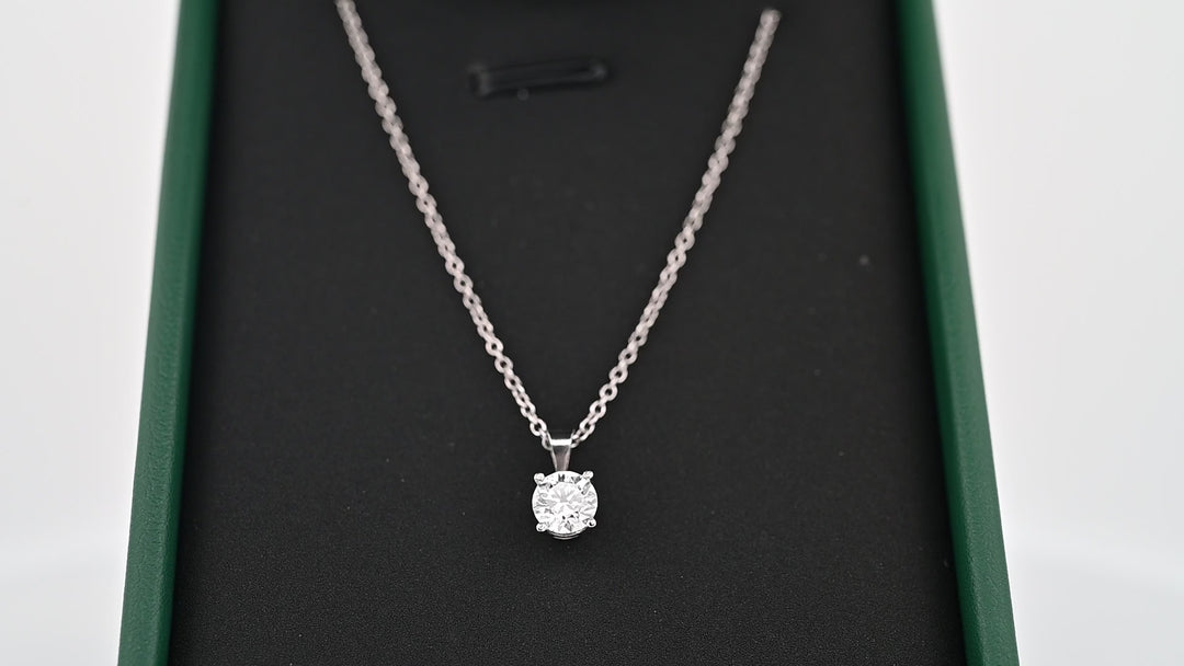 Elegant 0.5 CT platinum pendant with lab-grown diamond on display, symbolizing timeless luxury and sophistication.