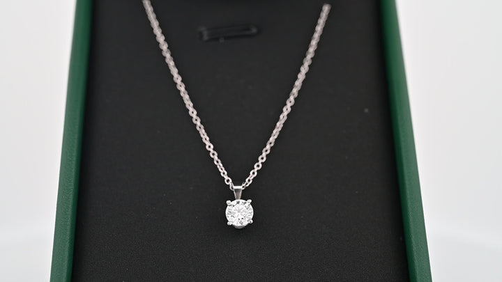 Elegant 0.5 CT platinum pendant with lab-grown diamond on display, symbolizing timeless luxury and sophistication.